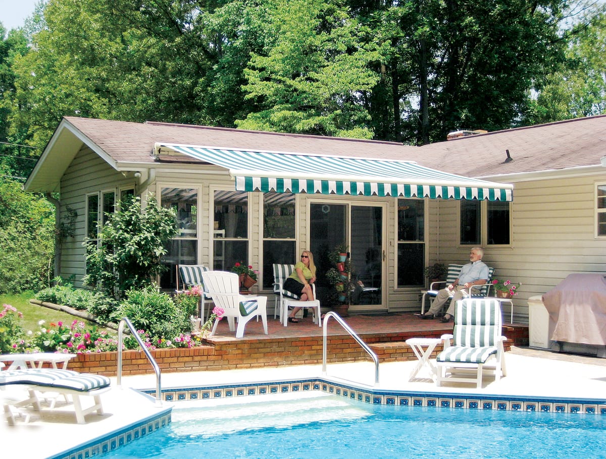 Retractable awning by pool