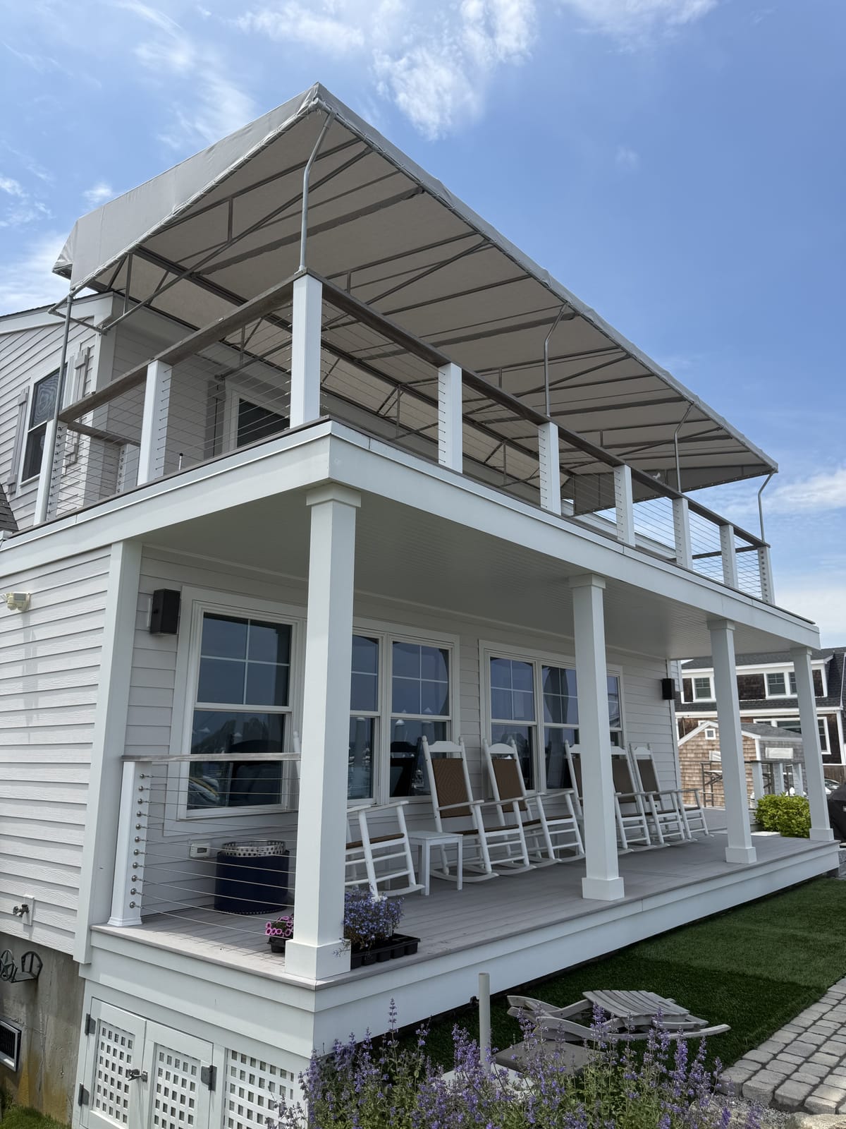 Rooftop deck canopy on a coastal home