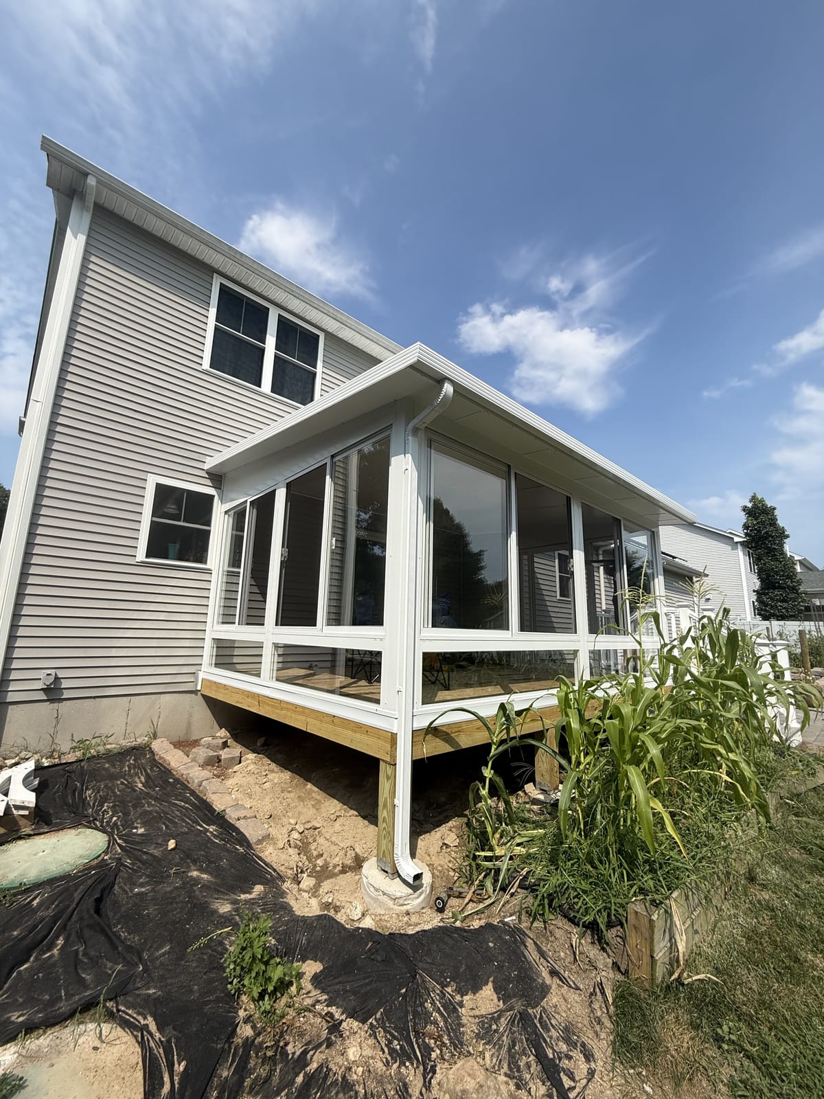 New three-season sunroom addition, rear exterior