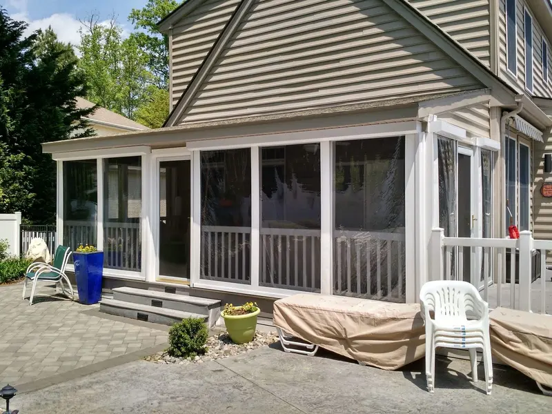 Motorized screen enclosure on home