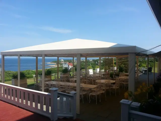Freestanding white dining canopy overlooking the ocean at the Spring House Hotel, Block Island