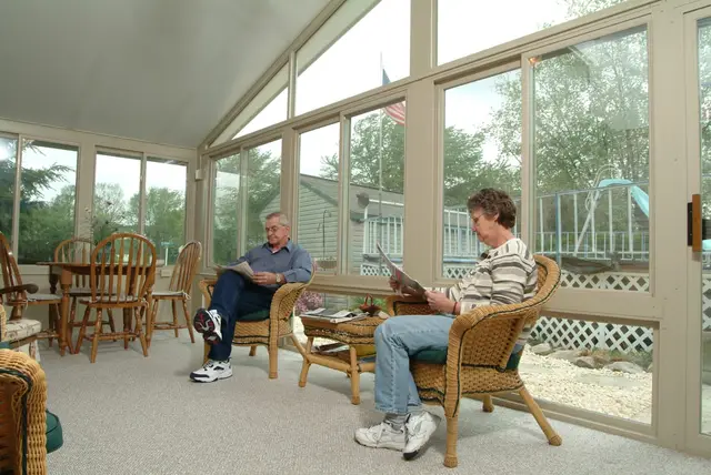 Three-season room interior, furnished and in use