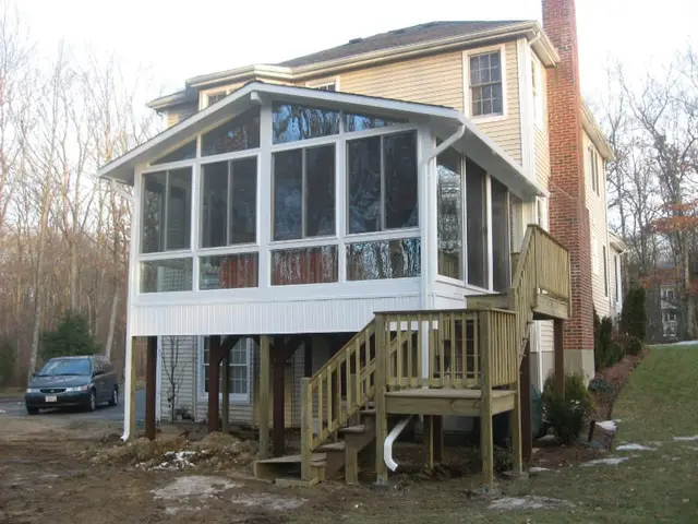 Elevated three-season room on posts, new construction