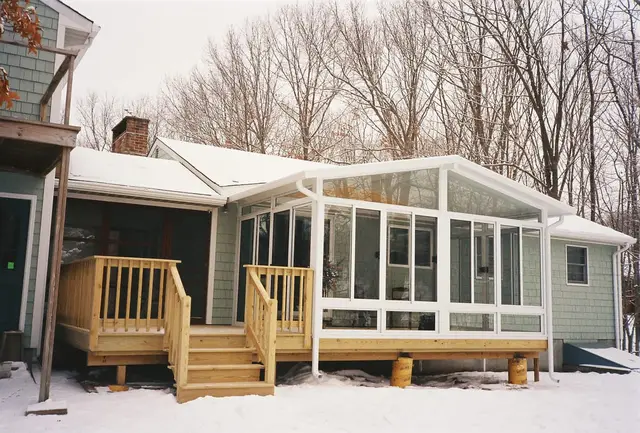 Three-season room holding up to a New England winter