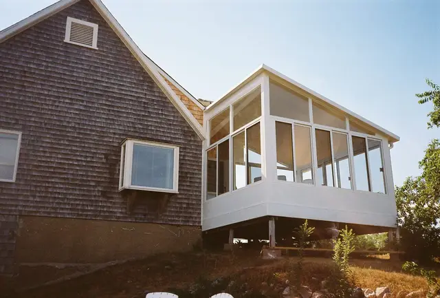 Curved-eave patio room, side angle