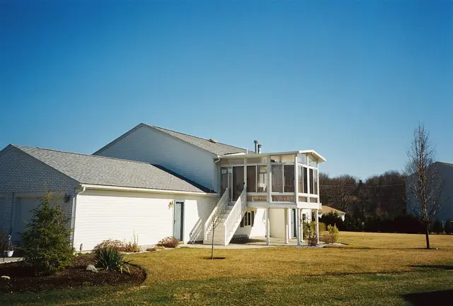 Elevated sunroom with exterior stair