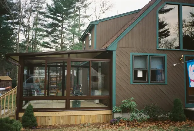 Brown-frame sunroom on a cedar contemporary