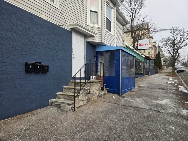 Blue vinyl-windowed entry vestibule at Frank & Laurie's restaurant in Providence, RI