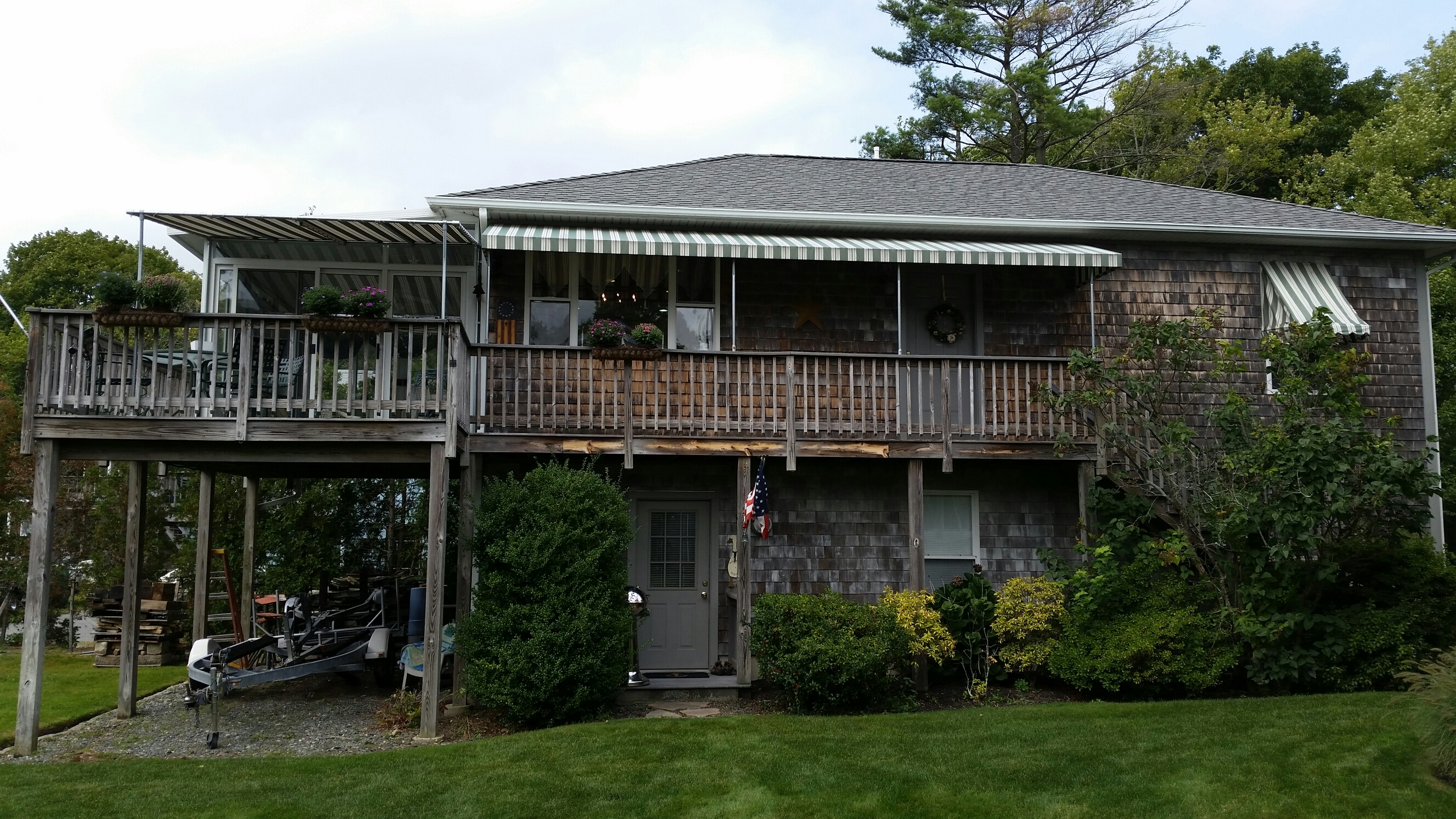 Stationary deck awning on residential home